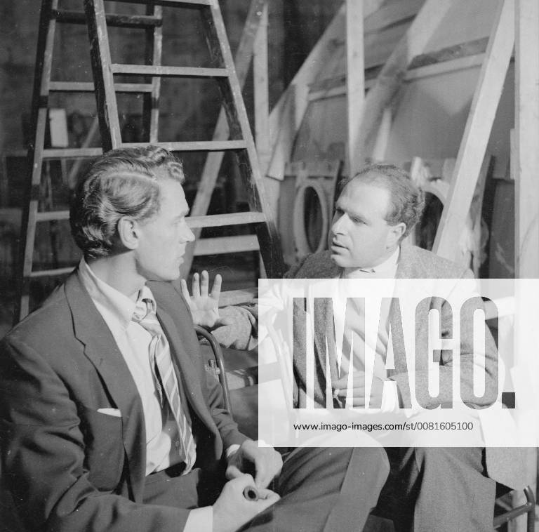 Theatre and film director Peter Brook at Elstree Studios in 1955 with actor Paul Scofield during production of Heaven and Earth, a made for TV drama co scripted by Brook and Denis Cannan and based on Jonah and the Whale., United Kingdom England