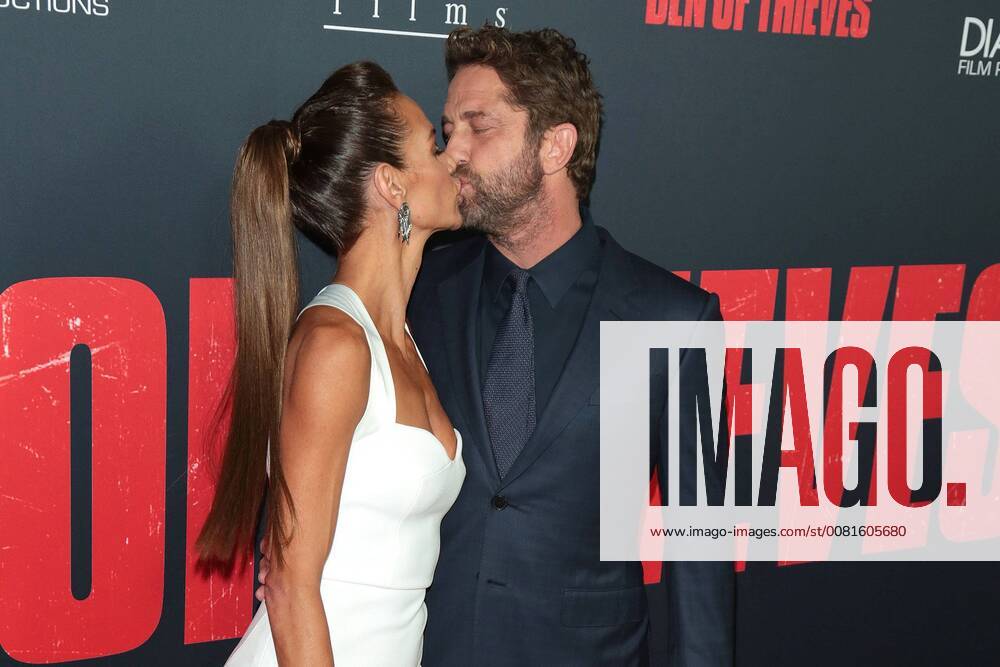 Gerard Butler and his girlfriend Morgan Brown at the den of thieves movie premiere on 17 01 2018 in Los Angeles the of thieves movie premiere in Los Angeles 2018