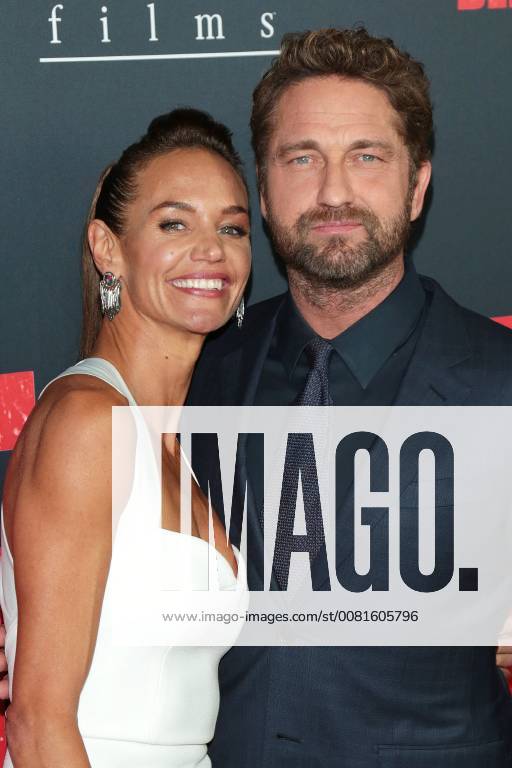 Gerard Butler and his girlfriend Morgan Brown at the den of thieves movie premiere on 17 01 2018 in Los Angeles the of thieves movie premiere in Los Angeles 2018