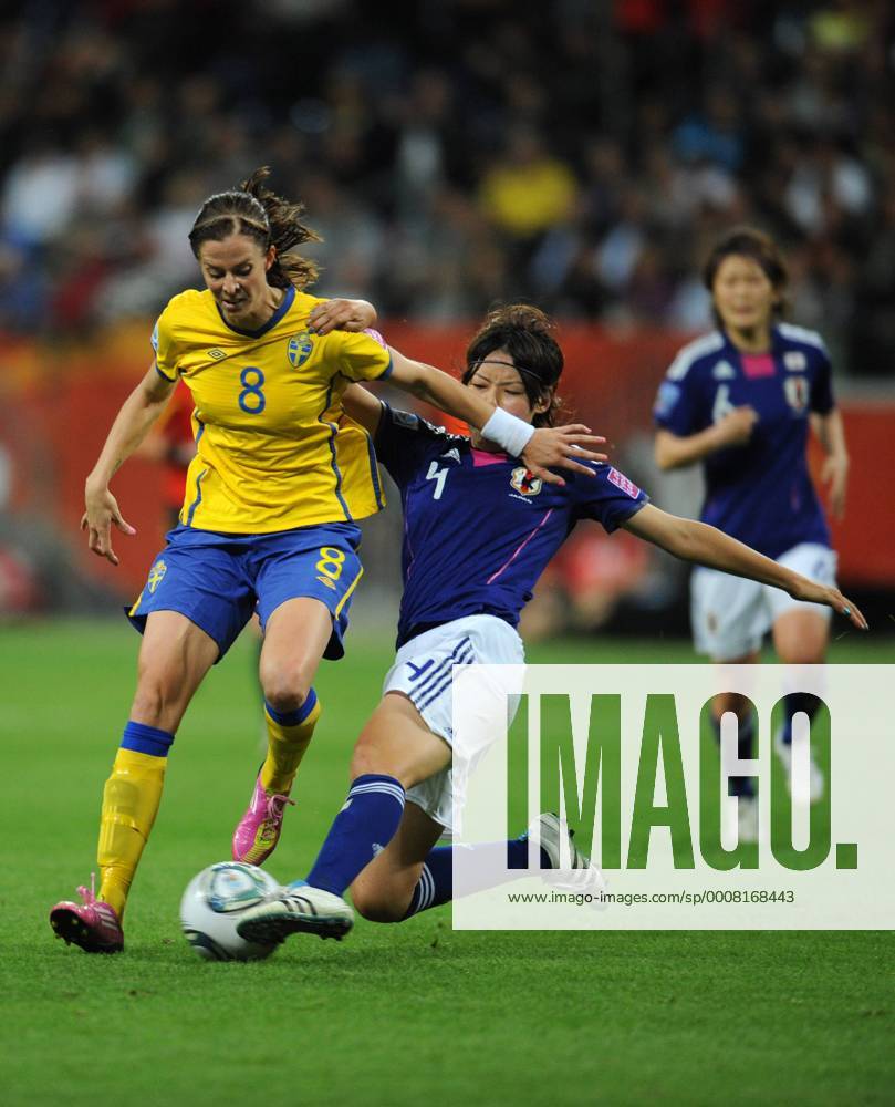 Saki Kumagai (front R) of Japan vies with Lotta Schelin of Sweden during their semifinal at the 2011 FIFA Women s World Cup in Frankfurt, JPN - SWE