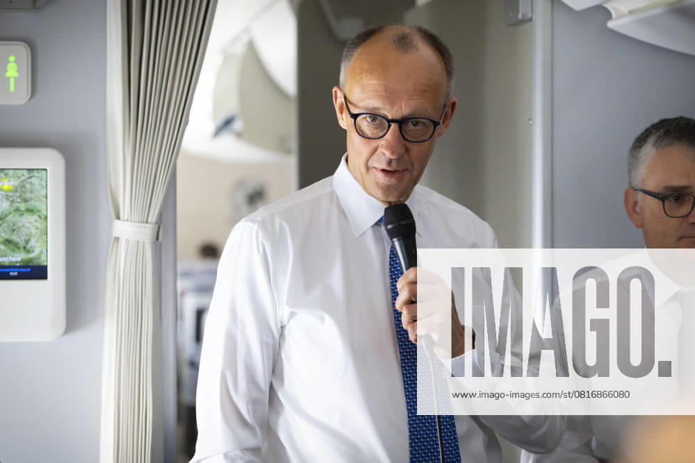 Friedrich Merz CDU , Federal Chancellor, on board an Airbus A350, on the flight to Paris, in conversation with journalists Berlin, 07 05 2025 Photographed on behalf of the Federal Foreign Office Berlin Germany