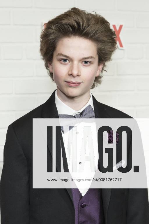 USA: Netflix Everything Sucks premiere Quinn Liebling wearing suit by Joseph Abboud attends Netflix premiere Everything Sucks! season 1 at AMC 34th street New York New York United States AMC 34th Street LevxRadin