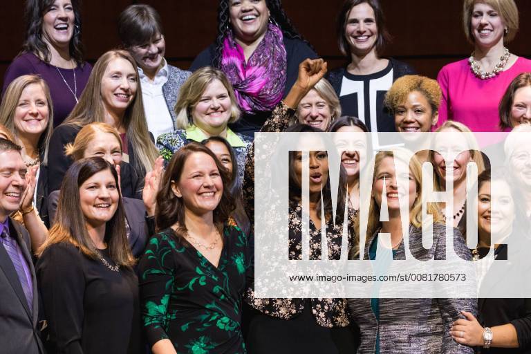 Washington, DC, United States - (Center L-R): Kristen Perry of Chicago, Ill., former First Lady Of the U.S. Michelle Obama, and other school counselors, pose for a photo after the 2018 School Counselor of the Year awards ceremony, at the John F. Kennedy Center for the Performing Arts in Washington, D.C., on Friday, Feb. 2, 2018. ( ) Washington United States - ZUMAn230 20180202_zaa_n230_373