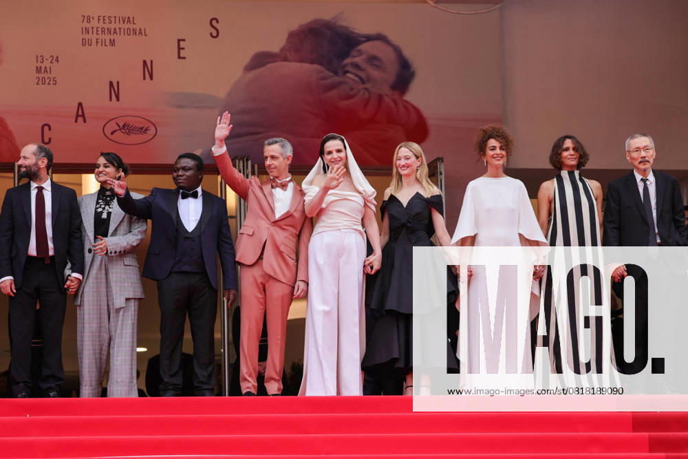 Cannes - Opening Ceremony Jury Member Carlos Reygadas, Leïla Slimani, Payal Kapadia, Dieudo Hamadi, Alba Rohrwacher, Jury President Juliette Binoche, Jeremy Strong, Halle Berry and Hong Sang-soo attend the red carpet for the opening ceremony and Partir Un Jour (Leave One Day) screening at the 78th annual Cannes Film Festival at Palais des Festivals on May 13, 2025 in Cannes, France. Photo by Shootpix ABACAPRESS.COM Cannes France