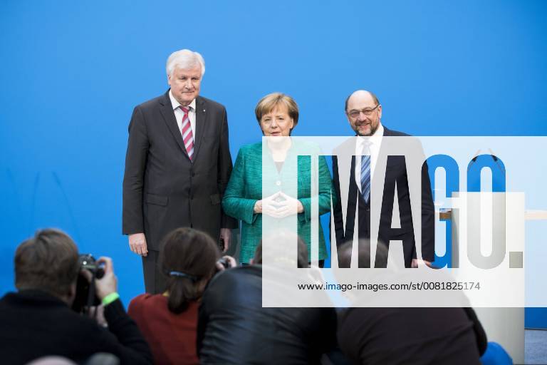 Angela Merkel Horst Seehofer and Martin Schulz federal party headquarters Konrad Adenauer House in Berlin posing for the photographers at the end of a press conference for the announcement of the compromise reached in the coalition agreement in the CDU on 7 February 2018 Coalition talks in Berlin