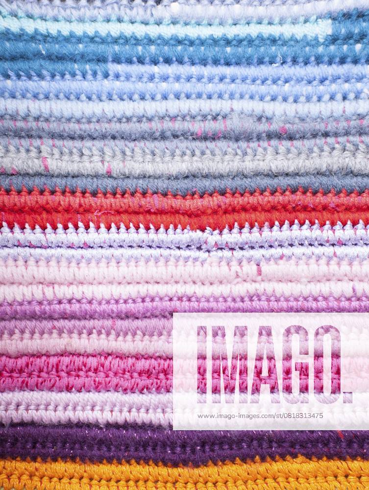 Gehäkelter Hintergrund mit verschiedenen Farben, für Design Crochet background with different colors, for design