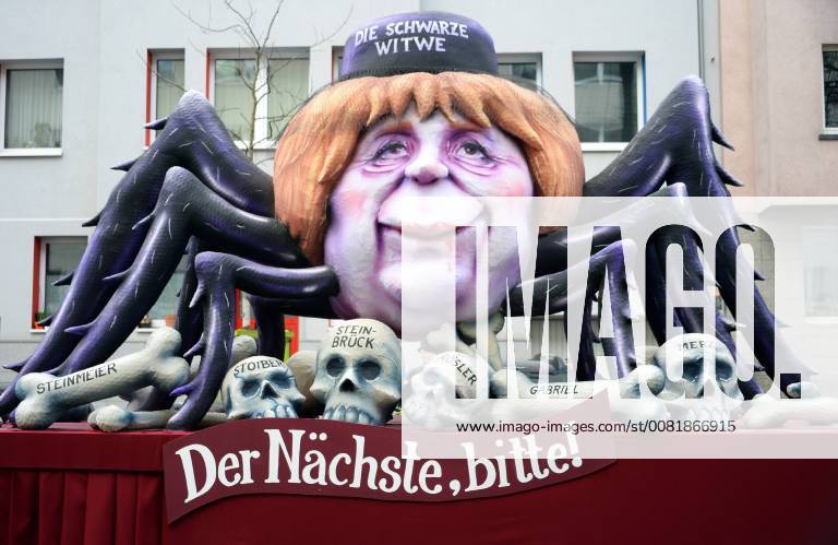 Germany NRW Düsseldorf parade theme railcars by Jaques Tilly Angela Merkel as black widow the next please