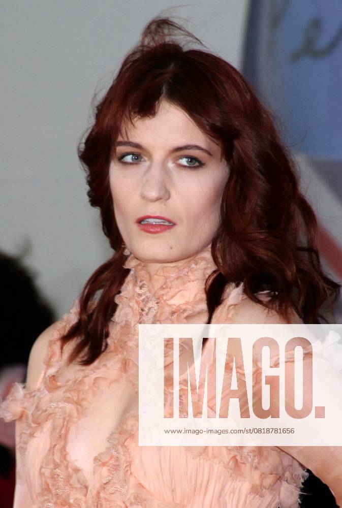 The Brit Awards 2012 arrivals Florence Welch of Florence and The Machine The Brit Awards 2012 arrivals, O2 Greenwich, London, England 21st February 2012 Brits headshot portrait pink peach orange ruffle frills CAP ROS Steve Ross London UK Great Britain