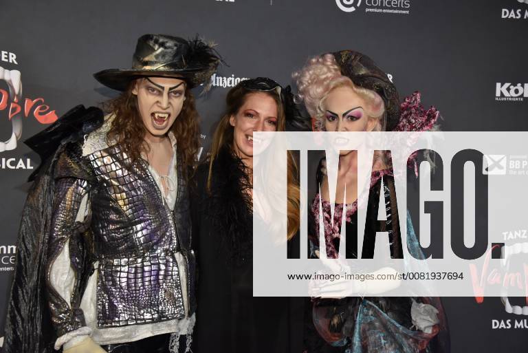 The presenter Mara Bergmann m and the vampire Albert Jan Kinemar l and Elise Doorn r comes on 17 02 2018 in Cologne for the premiere of the musical dance of the vampires in the musical dome