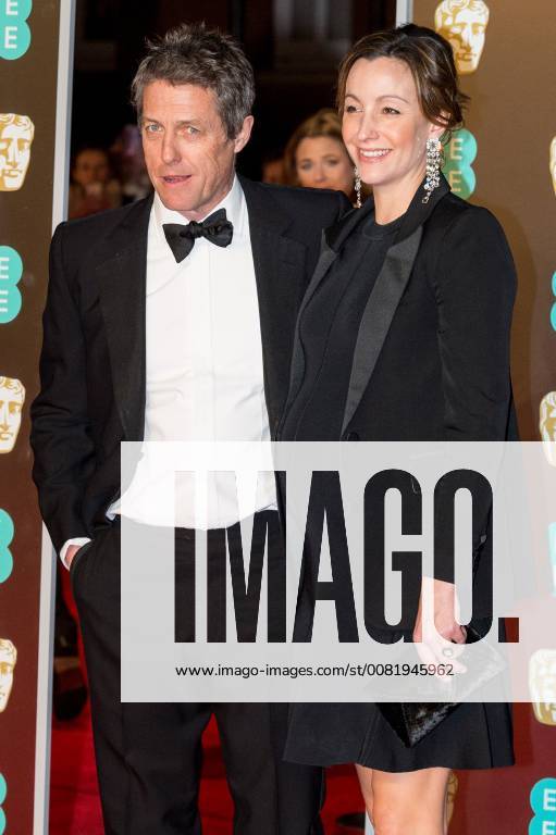 London, London, UK - HUGH GRANT and ANNA EBERSTEIN arrives on the red carpet for the EE British Academy Film Awards 2018, held at the Royal Albert Hall, London, UK. London UK - ZUMAl94_ 20180218_zaf_l94_044
