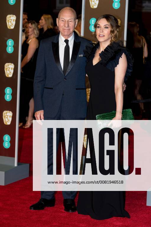 London, London, UK - SIR PATRICK STEWART and SUNNY OZELL arrives on the red carpet for the EE British Academy Film Awards 2018, held at the Royal Albert Hall, London, UK. London UK - ZUMAl94_ 20180218_zaf_l94_073