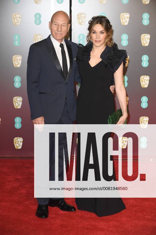 English actor Patrick Stewart and American singer Sunny Ozell attend The British Academy Film Awards (BAFTA) at the Royal Albert Hall in London on February 18, 2018. LON20180218201 PAULxTREADWAY