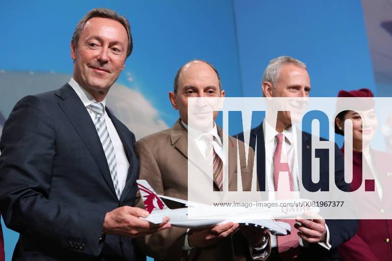 Airbus Chief Operating Officer Fabrice Bregier, Qatar Airways Group Chief Executive Akbar Al Baker, and the President of Civil Aerospace at Rolls Royce Chris Cholerton (from L) with a model aircraft after a press conference marking the delivery of the worldâ€s first Airbus A350-1000 airliner to launch customer Qatar Airways, Marina Lystseva TASS TS074E7F