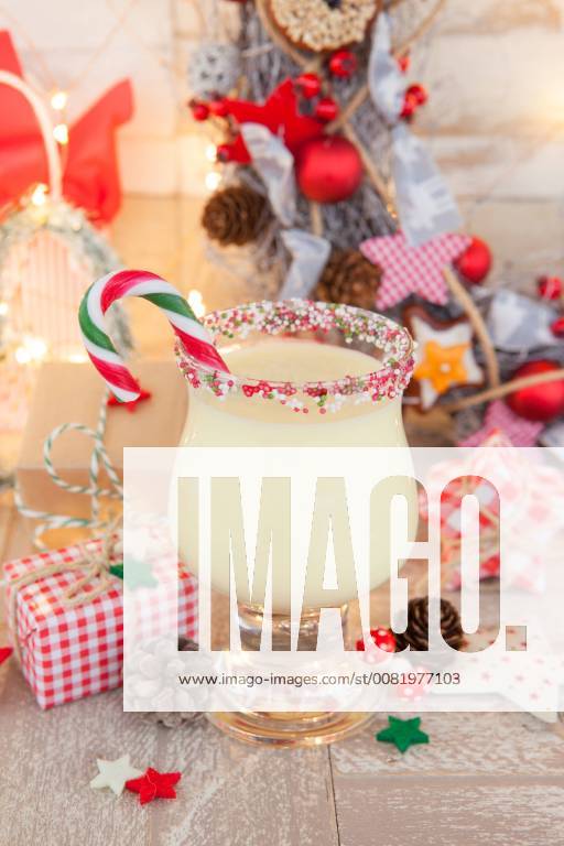 Eggnog with candy cane with colourful decoration for Christmas egg Nog with candy canes 1079704647
