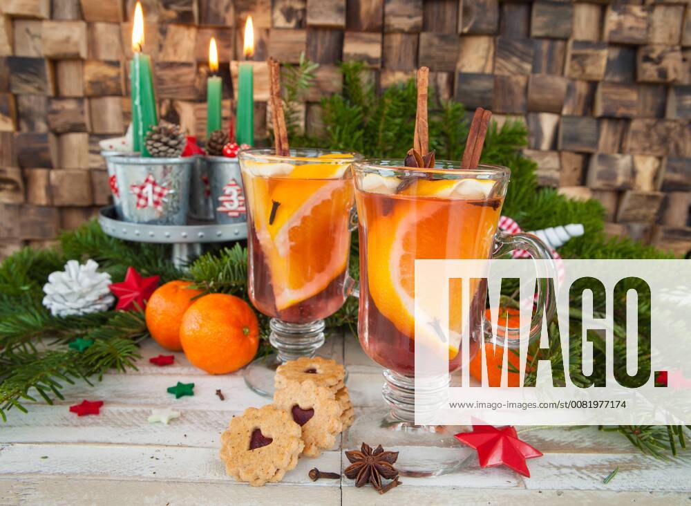 Hot punch with spices and orange hot mulled wine 1079704630