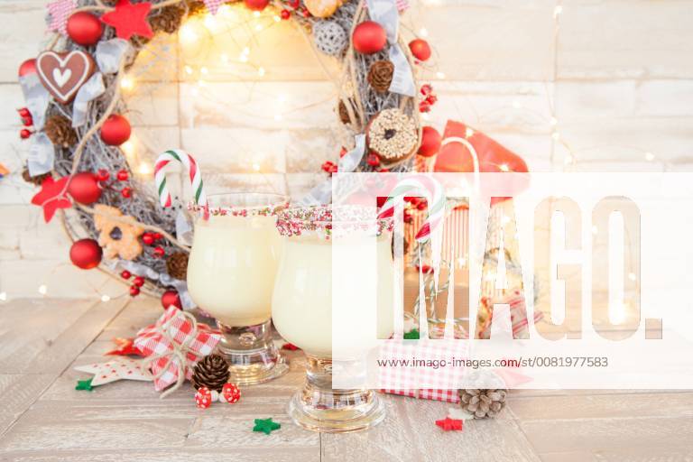 Eggnog with candy cane with colourful decoration for Christmas egg Nog with candy canes 1079704645