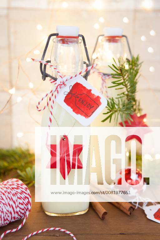 Bottle of eggnog with colourful decoration for Christmas homemade egg nog 1079704657