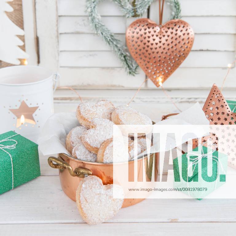 Butter cookies with powdered sugar heart-shaped Christmas Christmas cookies 1079704589