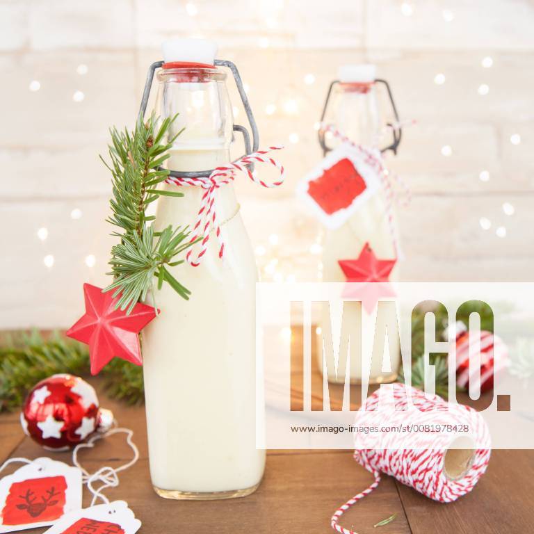 Bottle of eggnog with colourful decoration for Christmas homemade egg nog 1079704659