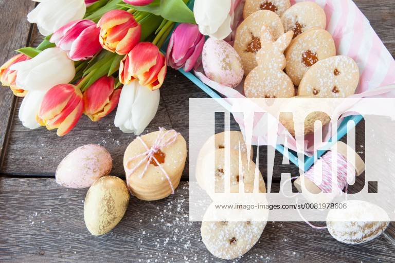 Filled cookies with jam and powdered sugar at Easter jam filled easter cookies 1079704741