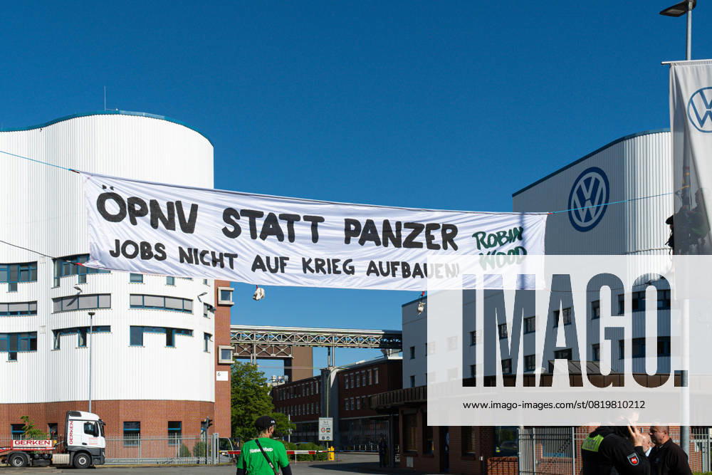 Osnabrück, Germany 19 May 2025 In the picture Activists from Robin Wood, started an action in front of the Volkswagen plant in Osnabrück today, Monday The motto was Public transport instead of tanks Dont build jobs on war VW Volkswagen plant Lower Saxony