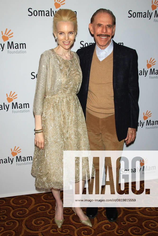 Life Is Love , the Somaly Mam Foundation Gala 2013 Mary & Peter Max Life Is Love , the Somaly Mam Foundation Gala 2013 at Gotham Hall, New York, NY., USA. October 23rd, 2013 full length black dress suit jacket beige gold lace dress top trousers moustache mustache facial hair married husband wife CAP LNC TOM LNC New York NY United States