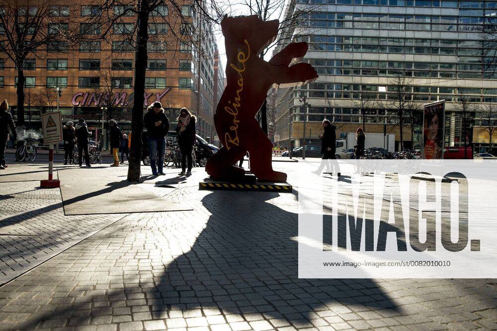 A Berlinale advertising Baer casts shadows near the Sony Center in Berlin on 23 February 2018