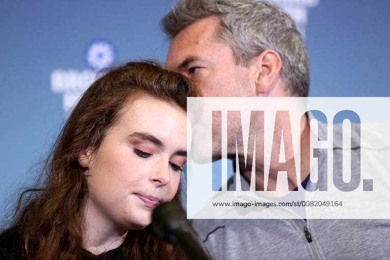 Deerfield Beach, Florida, U.S. - Marjory Stoneman Douglas shooting survivor MADDY WILFORD gets a kiss from her father, DAVID WILFORD, during a news conference on Monday, at Broward Health North. Wilford, the Marjory Stoneman Douglas High School junior who survived the Florida shooting, was discharged from Broward Health North on Monday. She had been shot three times and was barely clinging to life. One bullet pierced her chest, another her torso and the third traveled through her right arm. Deerfield Beach U.S. - ZUMAm67_ 20180226_zaf_m67_002