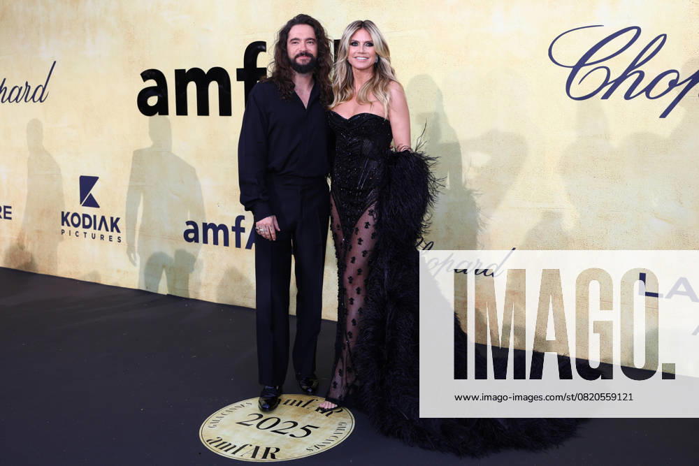 Antibes, Cote D azur, France: HEIDI KLUM and TOM KAULITZ pose during the photocall for the amfAR Gala Cannes in Antibes, France Antibes France - ZUMAc179 20250522_zep_c179_020
