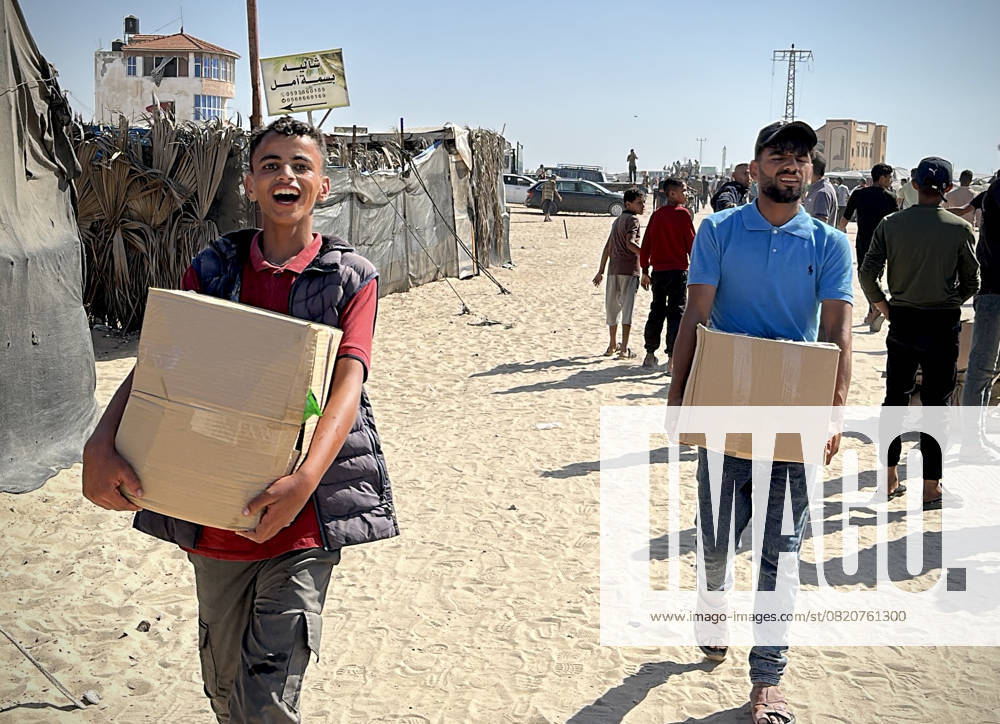 Palestinians seeking aid gather near an aid distribution site run by the U.S.-backed Gaza Humanitarian Foundation Palestinians seeking aid gather near an aid distribution site run by the U.S.-backed Gaza Humanitarian Foundation, in Rafah, in the southern Gaza Strip, May 27, 2025. Photo by Moaz Abu Taha apaimages Rafah Gaza Strip Palestinian Territory 270525_Rafah_MT_00(5)