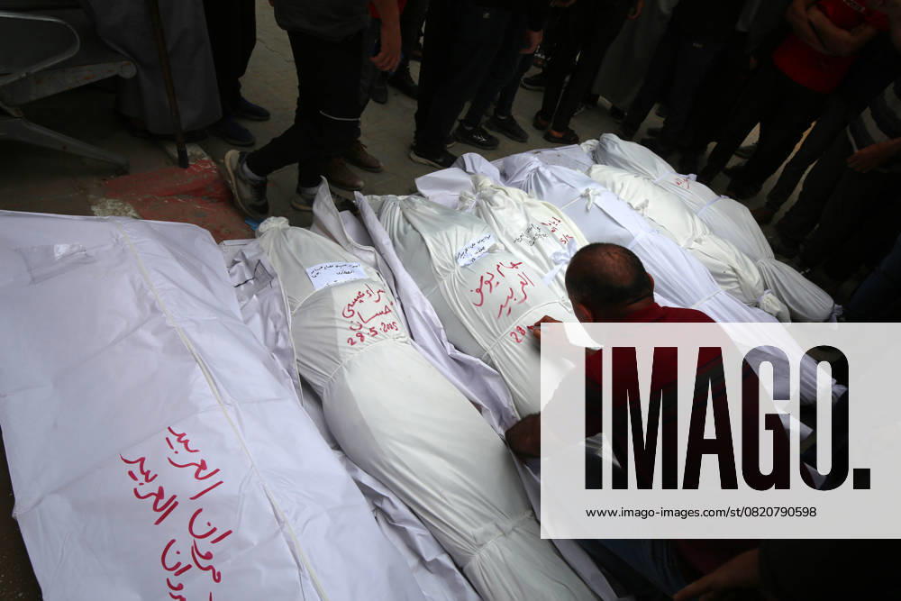 Relatives of Palestinians who lost their lives mourn after the Israeli army bombed several homes On Saftawi Street Relatives of Palestinians who lost their lives mourn after the Israeli army bombed several homes On Saftawi Street, north of Gaza Gaza city. The bodies of Palestinians who lost their lives in the attack are transferred to Al-Shifa Hospital in Gaza City, on May 28, 2025. Photo by Omar Ashtawy apaimages Gaza city Gaza Strip Palestinian Territory 280525_Gaza_OASH_00(11)