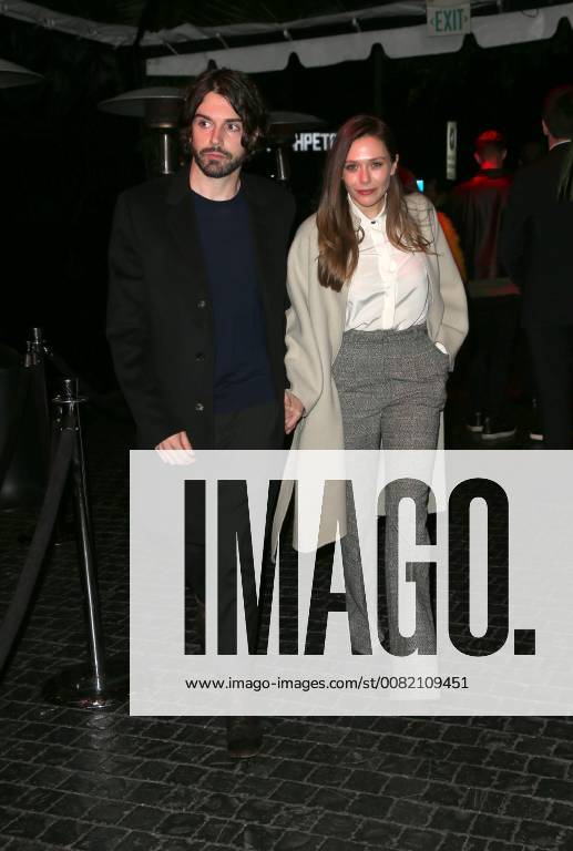 WEST HOLLYWOOD, CA - MARCH 1: Elizabeth Olsen, Robbie Arnett, at the 2018 Cadillac Oscar Celebration at the Chateau Marmont in Los Angeles, California on March 1, 2018.