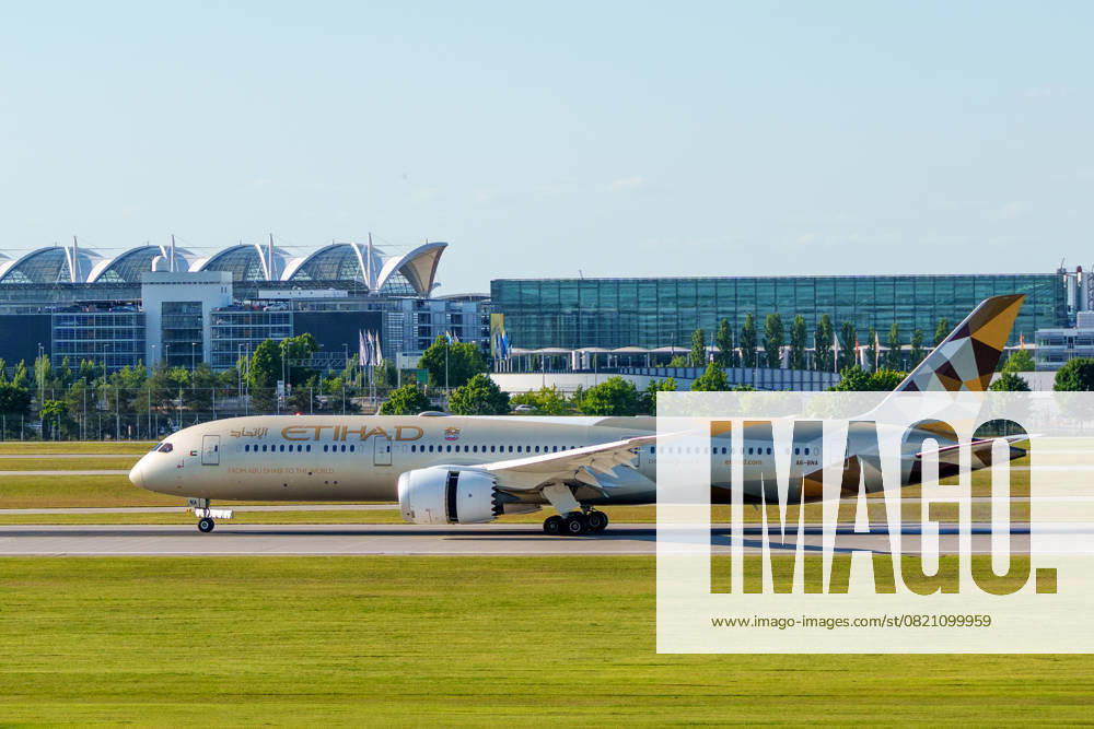 A Boeing 787-9 Dreamliner operated by Etihad Airways landing at Munich Airport. The jet with the registration A6-BNA wears the elegant gold-beige livery of the airline from Abu Dhabi
