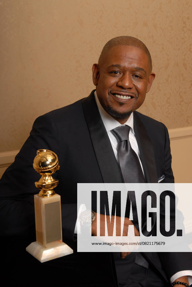 Pressroom - 64th Annual Golden Globe Awards FOREST WHITAKER Winner Best Performance By An Actor In A Motion Picture Drama for The Last King of Scotland Pressroom - 64th Annual Golden Globe Awards, Beverly Hills HIlton, Beverly Hills, California, USA. January 15th 2007. globes press room half length award trophy black suit jacket studio CAP AW Please use accompanying story Supplied by HFPA and 64th Golden Globe Awards Beverly Hills California United States