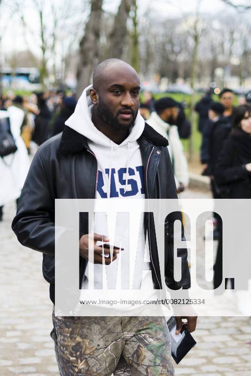 Paris, Ile-de-France, France - Virgil Abloh is seen on the street attending Undercover during Paris Fashion Week Women s A W 2018 Collection wearing a black leather jacket with grey hoodie and camo pants on March 2, 2018 in Paris, France. Paris France - ZUMAn230 20180302_zaa_n230_771