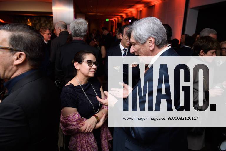 Beverly Hills, California, U.S. - Ildiko Enyedi director of the Oscar nominated foreign film On Body and Soul (Hungary), with Academy President John Bailey at the reception for the Foreign Language Film Award category for the 90th Oscars on Friday. Beverly Hills U.S. - ZUMAz03_ 20180302_shf_z03_209
