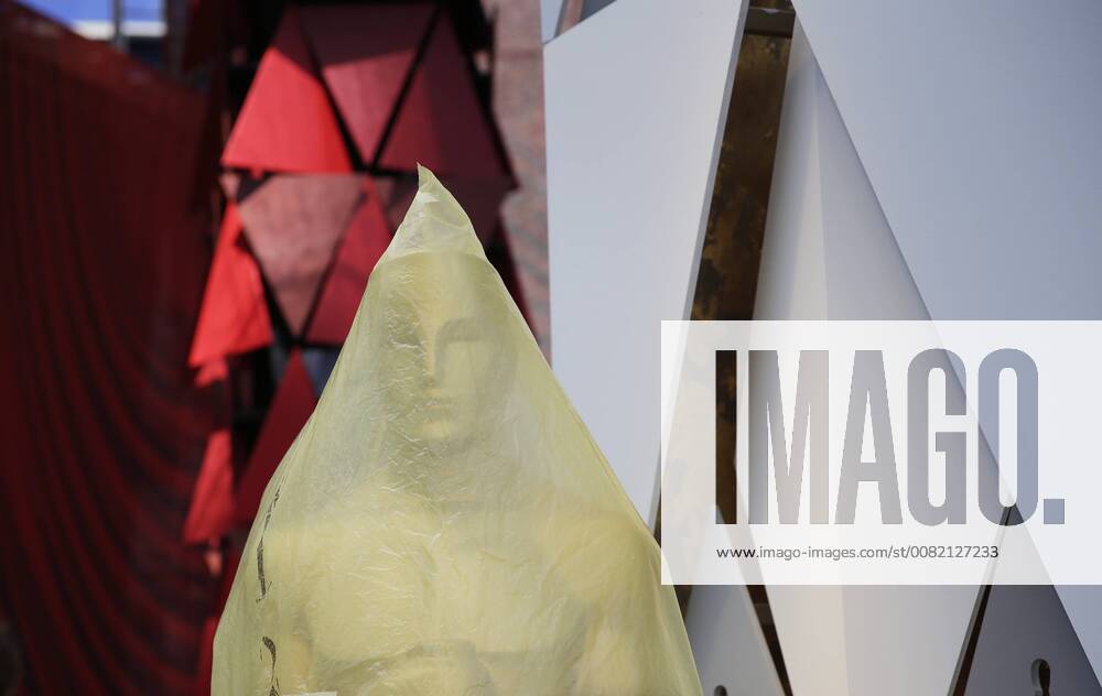 An Oscar statue is wrapped in plastic on the red carpet as preparations continue for the 90th annual Academy Awards in the Hollywood section of Los Angeles on March 3, 2018. Oscar winners will be announced during an ABC telecast on Sunday, March 4th at the Dolby Theatre. LAP20180303903 JOHNxANGELILLO