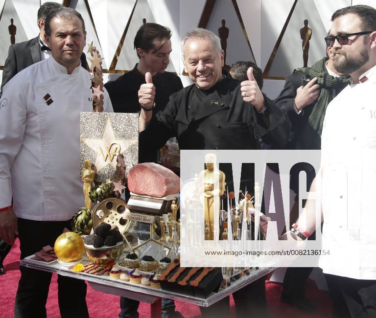 Chef Wolfgang Puck gives a thumbs up as he arrives on the red carpet for the 90th annual Academy Awards at the Dolby Theatre in the Hollywood section of Los Angeles on March 4, 2018. LAP20180304003 JOHNxANGELILLO