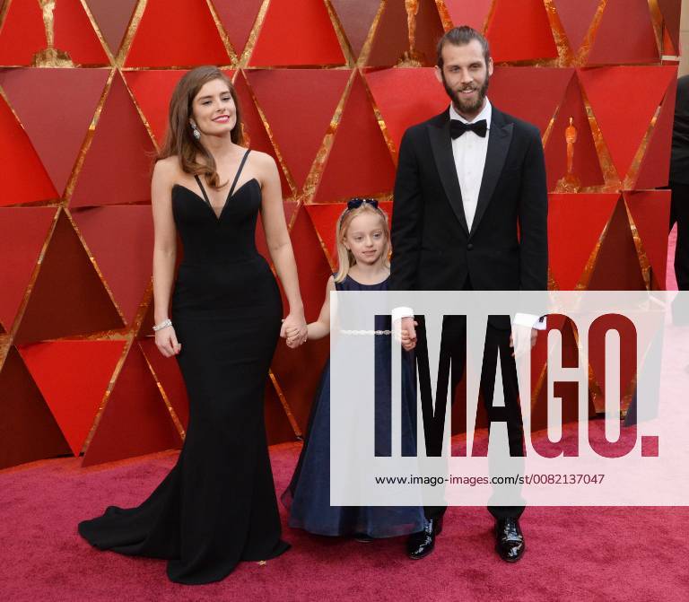 Writer Rachel Shenton (L), Maisie Sly and director Chris Overton arrive on the red carpet for the 90th annual Academy Awards at the Dolby Theatre in the Hollywood section of Los Angeles on March 4, 2018. LAP20180304818 JIMxRUYMEN