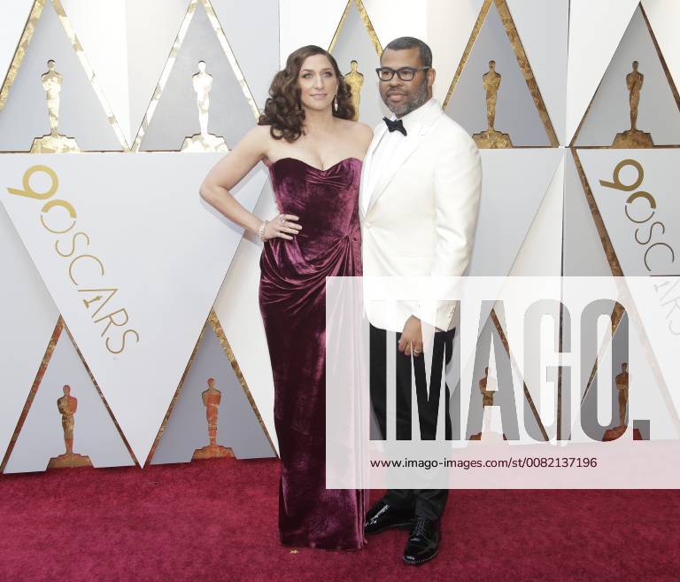 Actress Chelsea Peretti (L) and director Jordan Peele arrive on the red carpet for the 90th annual Academy Awards at the Dolby Theatre in the Hollywood section of Los Angeles on March 4, 2018. LAP20180304045 JOHNxANGELILLO