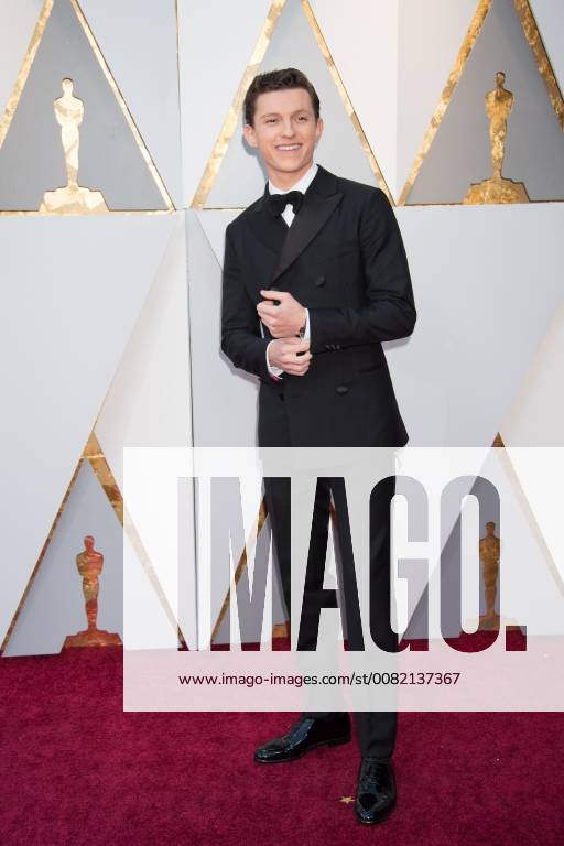 Tom Holland arrives on the red carpet of The 90th Oscars® at the Dolby® Theatre in Hollywood, CA on Sunday