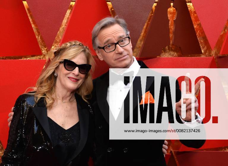 Laurie Feig and actor Paul Feig (R) arrive on the red carpet for the 90th annual Academy Awards at the Dolby Theatre in the Hollywood section of Los Angeles on March 4, 2018. LAP20180304849 JIMxRUYMEN