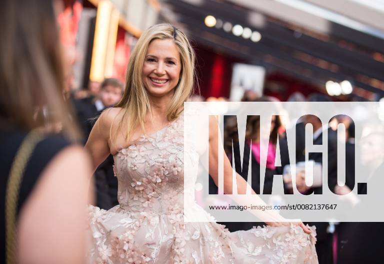 Mira Sorvino arrives on the red carpet of The 90th Oscars® at the Dolby® Theatre in Hollywood, CA on Sunday