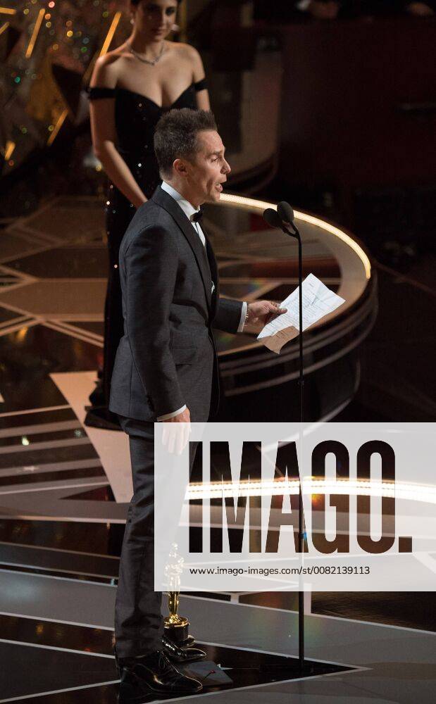 Sam Rockwell accepts the Oscar for performance by an actor in a supporting role for work on Three Billboards Outside Ebbing, Missouri during the live ABC Telecast of The 90th OscarsÂ® at the DolbyÂ® Theatre in Hollywood, CA on Sunday