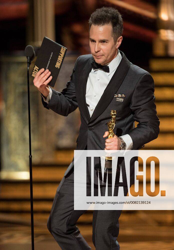 Sam Rockwell accepts the Oscar for performance by an actor in a supporting role for work on Three Billboards Outside Ebbing, Missouri during the live ABC Telecast of The 90th Oscars® at the Dolby® Theatre in Hollywood, CA on Sunday
