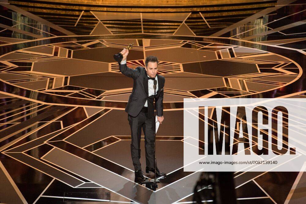Sam Rockwell accepts the Oscar for performance by an actor in a supporting role for work on Three Billboards Outside Ebbing, Missouri during the live ABC Telecast of The 90th Oscars® at the Dolby® Theatre in Hollywood, CA on Sunday