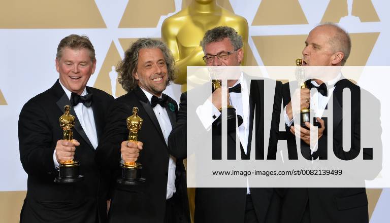 (L-R) Visual effects artists Richard R. Hoover, Paul Lambert, Gerd Nefzer, and John Nelson, winners of the award for Best Visual Effects award for Blade Runner 2049, appear backstage with their Oscars during the 90th annual Academy Awards at Loews Hollywood Hotel in the Hollywood section of Los Angeles on March 4, 2018. LAP201803041023 JIMxRUYMEN