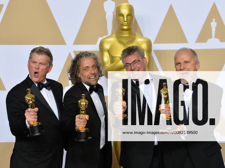 (L-R) Visual effects artists Richard R. Hoover, Paul Lambert, Gerd Nefzer, and John Nelson, winners of the award for Best Visual Effects award for Blade Runner 2049, appear backstage with their Oscars during the 90th annual Academy Awards at Loews Hollywood Hotel in the Hollywood section of Los Angeles on March 4, 2018. LAP201803041024 JIMxRUYMEN
