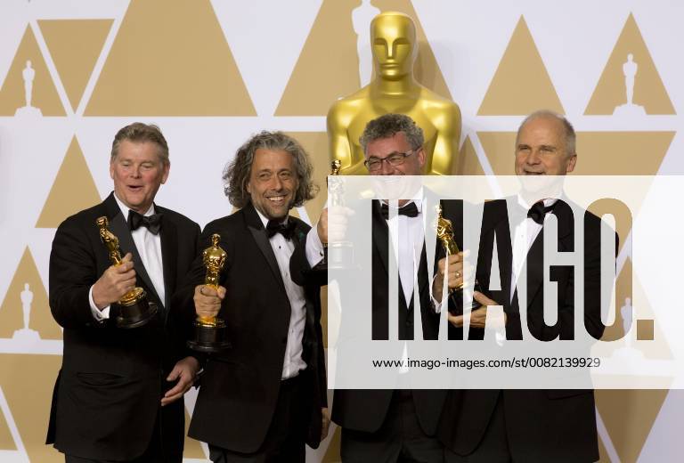 (L-R) Visual effects artists Richard R. Hoover, Paul Lambert, Gerd Nefzer and John Nelson, winners of the Best Visual Effects award for Blade Runner 2049 , pose in the press room during the 90th annual Academy Awards ceremony at the Dolby Theatre in Hollywood, California, on 4 March 2018. The Oscars are presented for outstanding individual or collective efforts in 24 categories in filmmaking. 90th annual Academy Awards ceremony !ACHTUNG: NUR REDAKTIONELLE NUTZUNG!