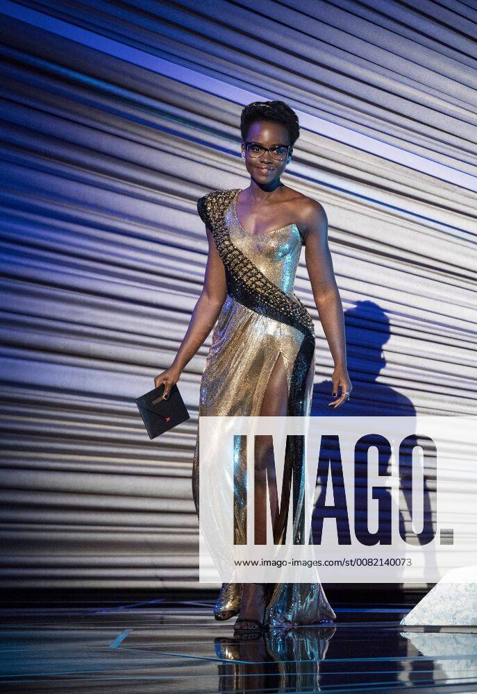 Lupita Nyong o present the Oscar for achievement in production design during the live ABC Telecast of The 90th Oscars® at the Dolby® Theatre in Hollywood, CA on Sunday